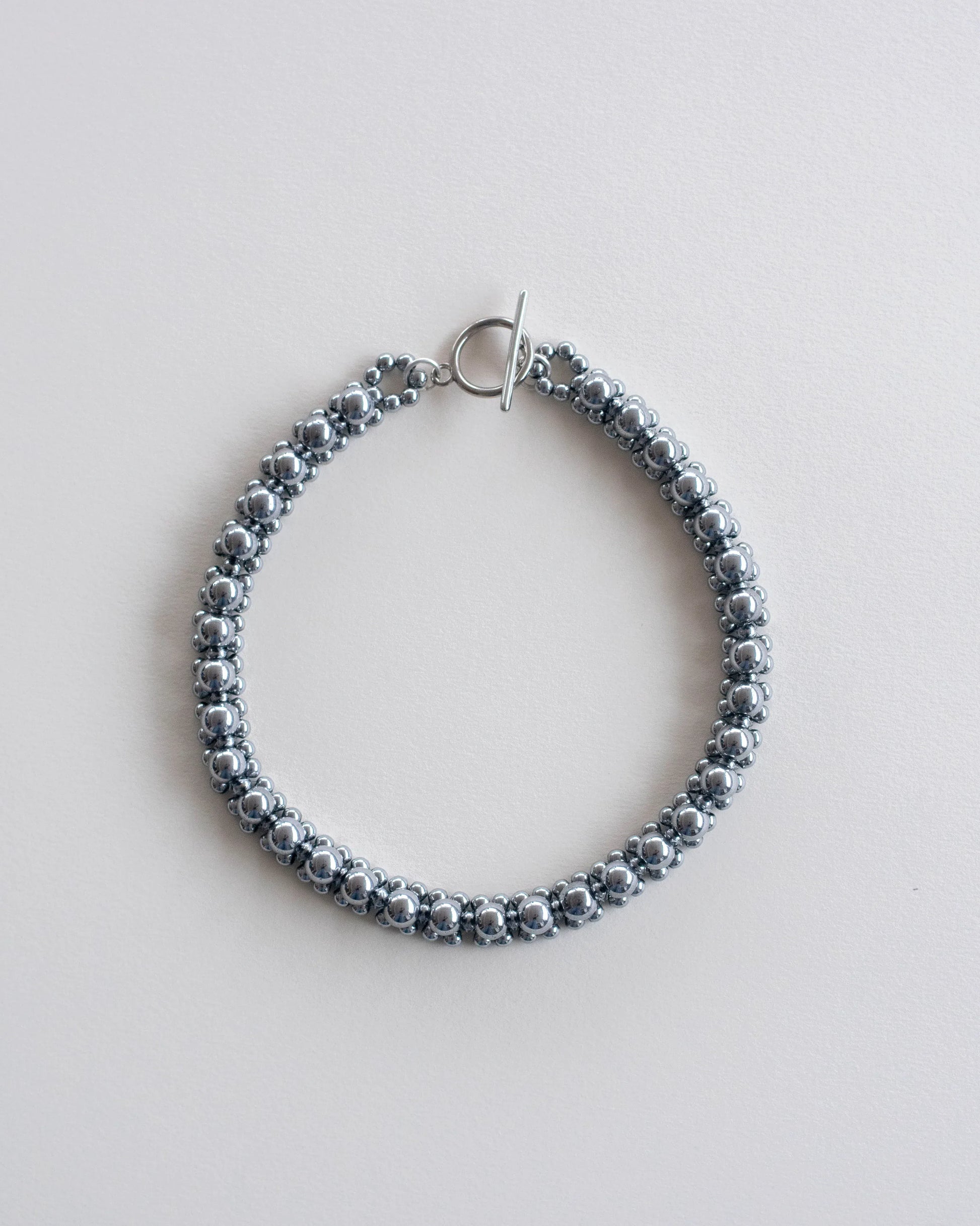 C -ET- C STRUNG D002 Mini - Hematite Necklace