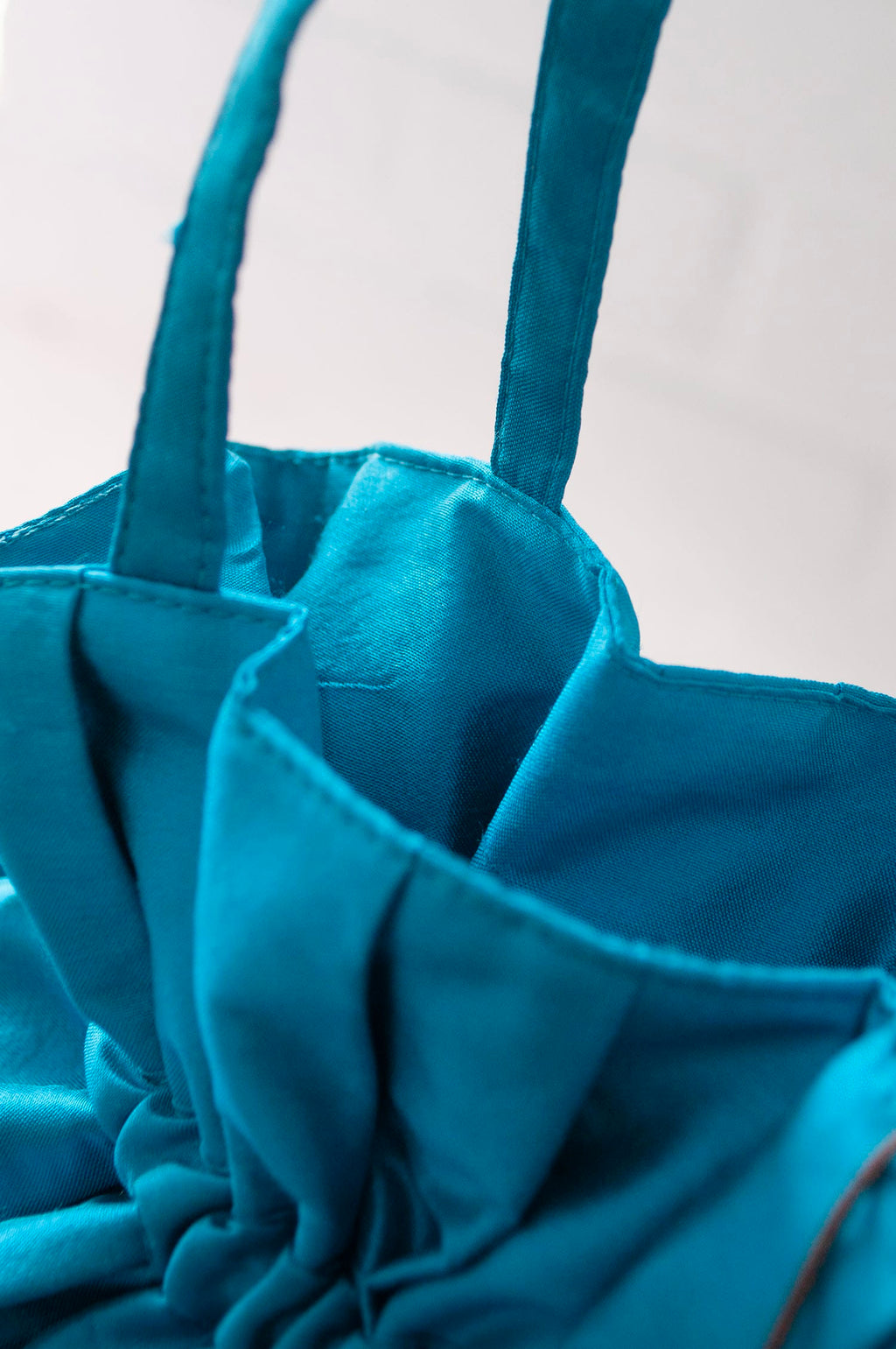 Dollis Goods Drawstring bag Occasion Bag in Aqua Blue