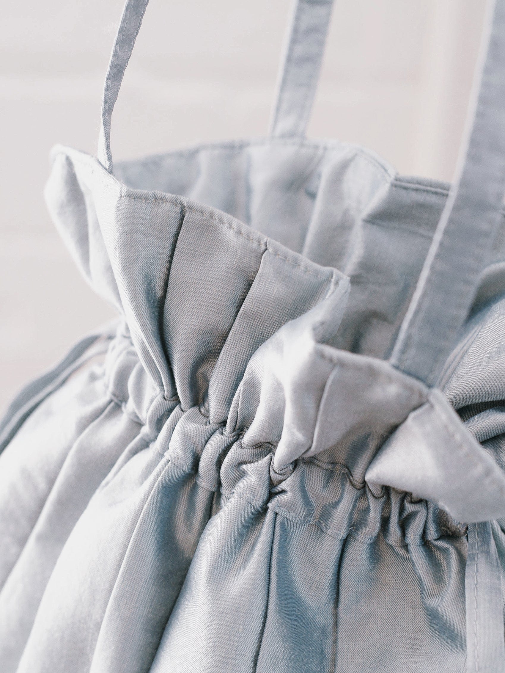 Dollis Goods Drawstring bag Occasion Bag in Blue