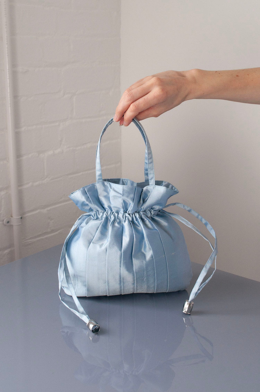 Dollis Goods Drawstring bag Occasion Bag in Blue