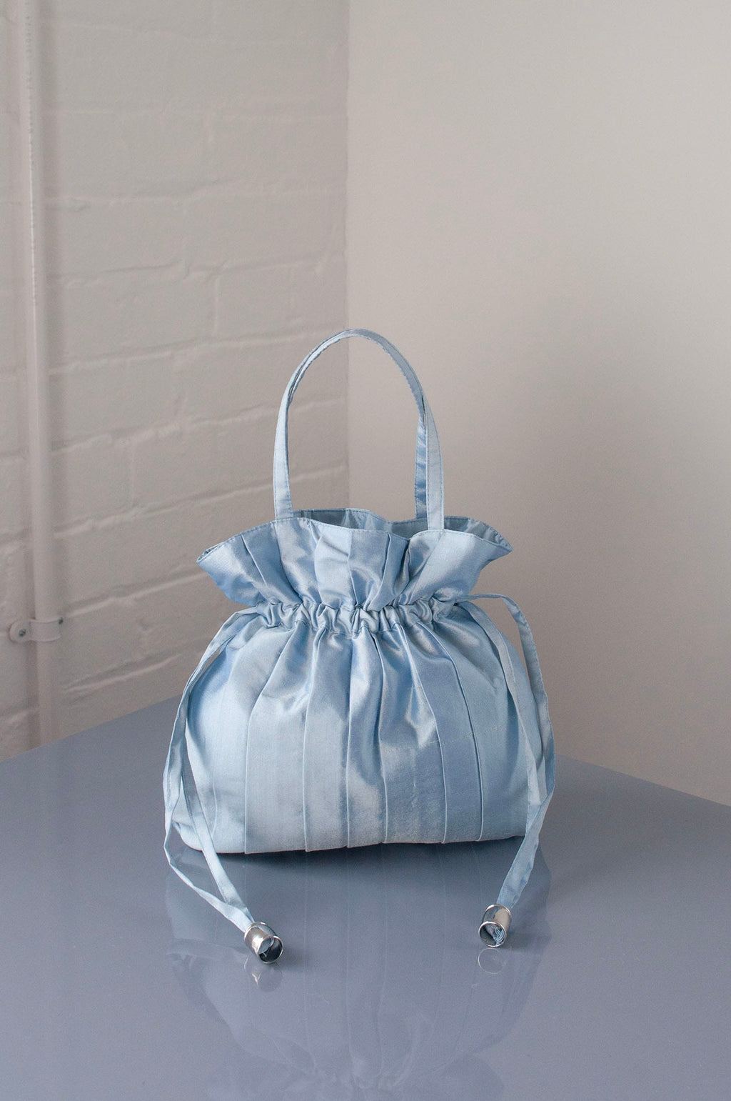 Dollis Goods Drawstring bag Occasion Bag in Blue
