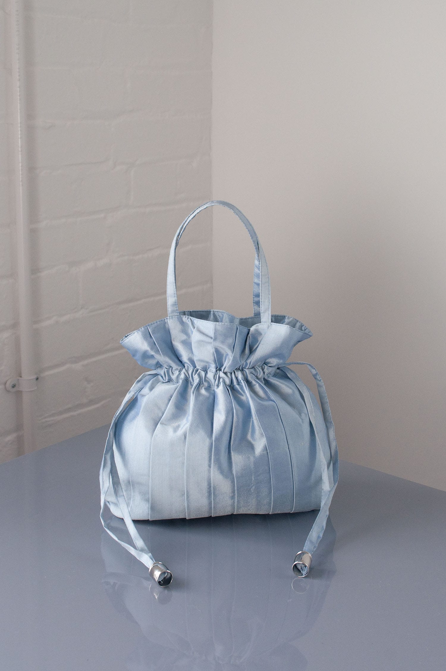 Dollis Goods Drawstring bag Occasion Bag in Blue