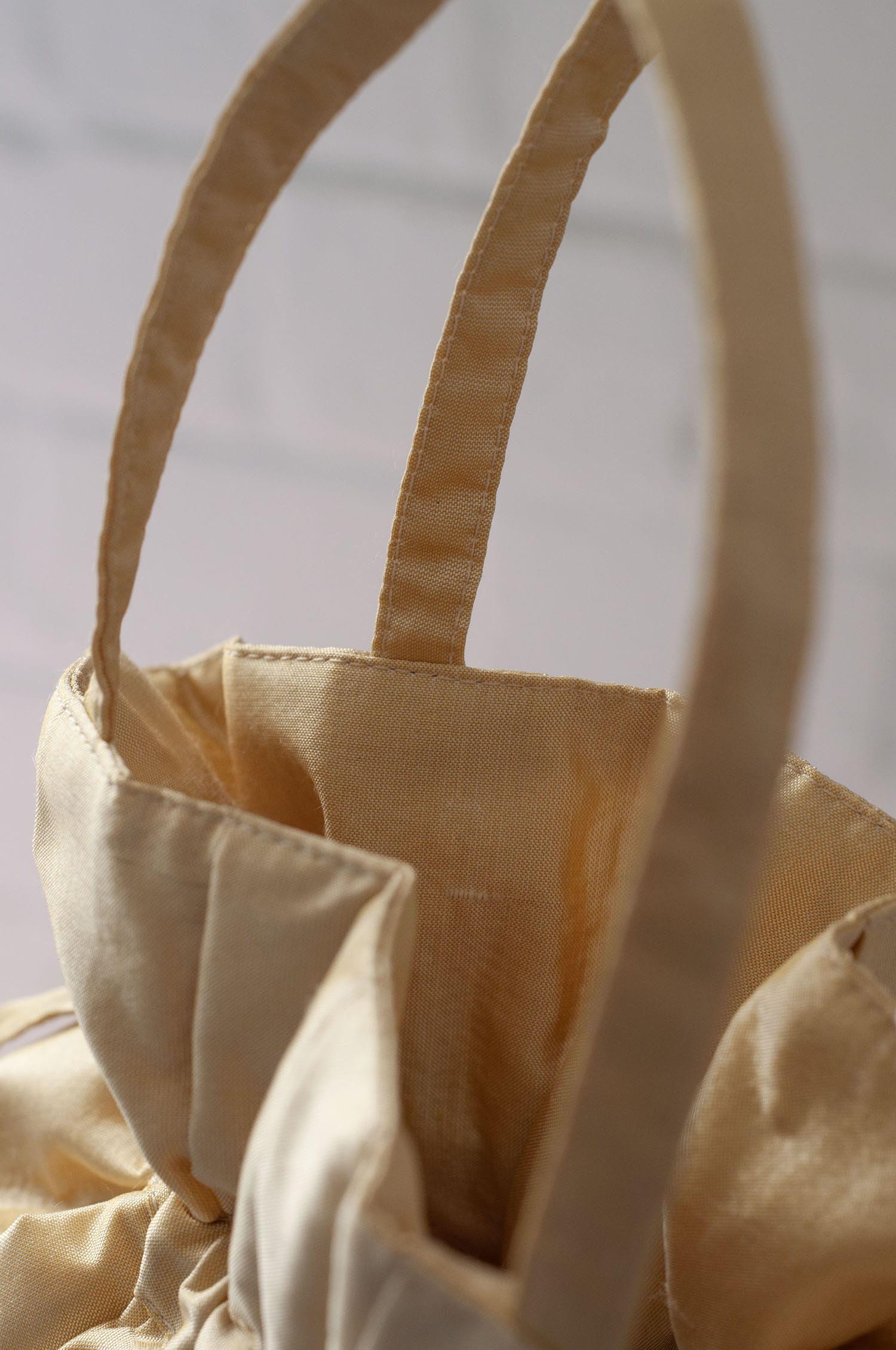 Dollis Goods Drawstring bag Occasion Bag in Butter Yellow