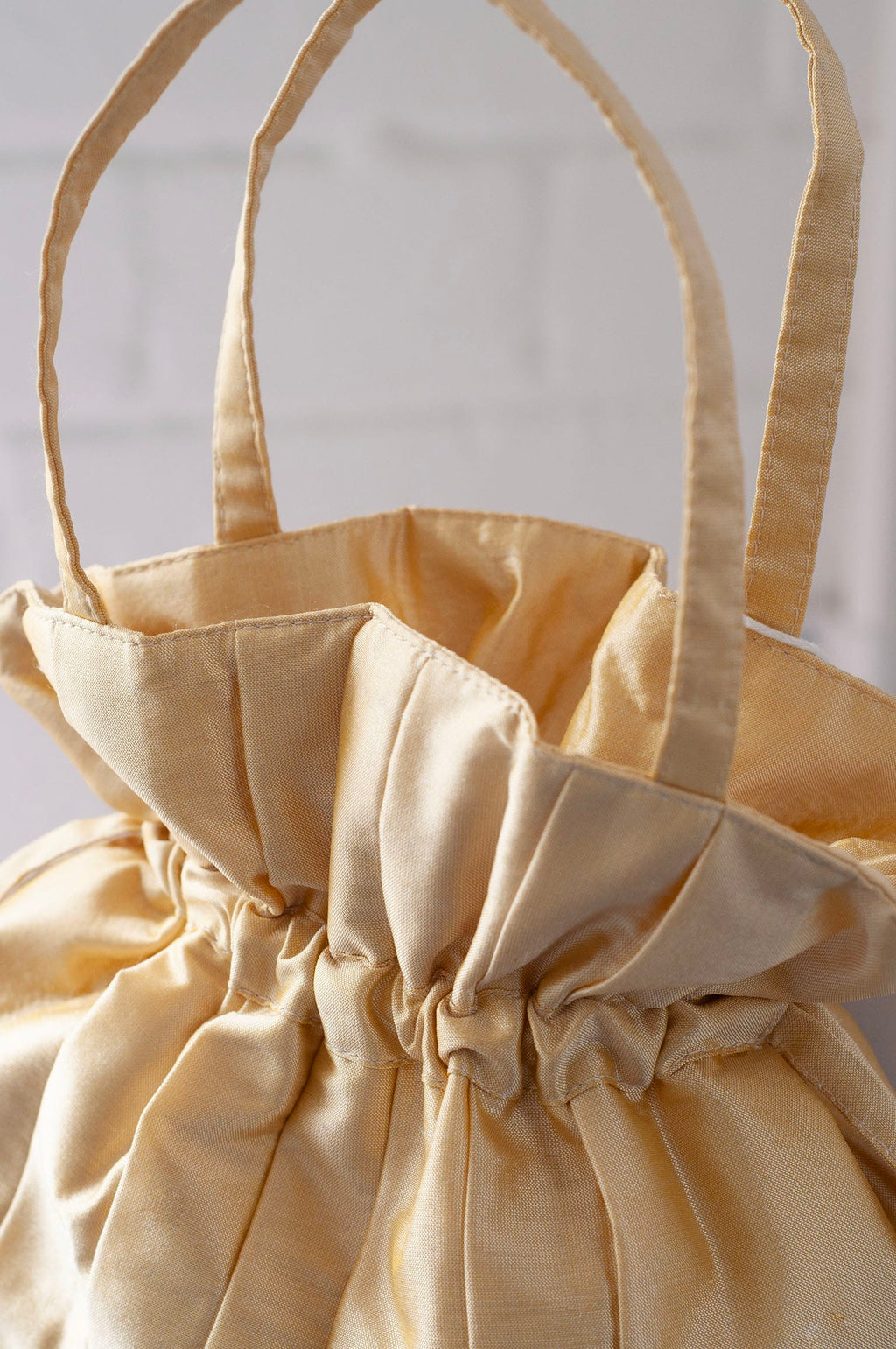 Dollis Goods Drawstring bag Occasion Bag in Butter Yellow