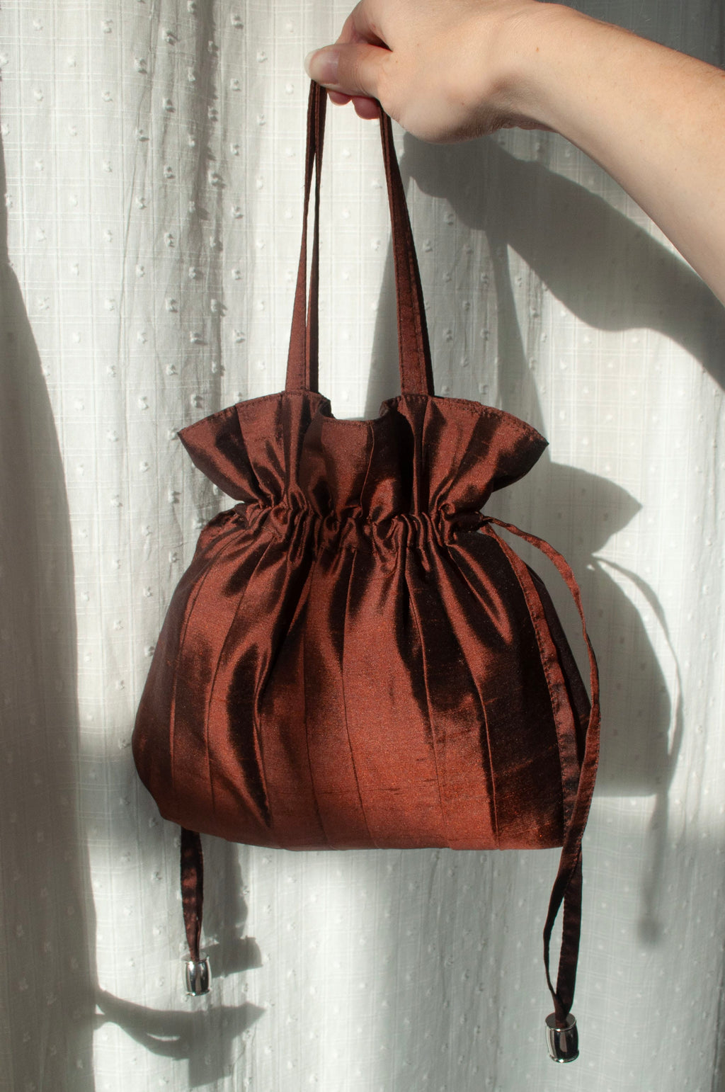 Dollis Goods Drawstring bag Occasion Bag in Cocolate Brown
