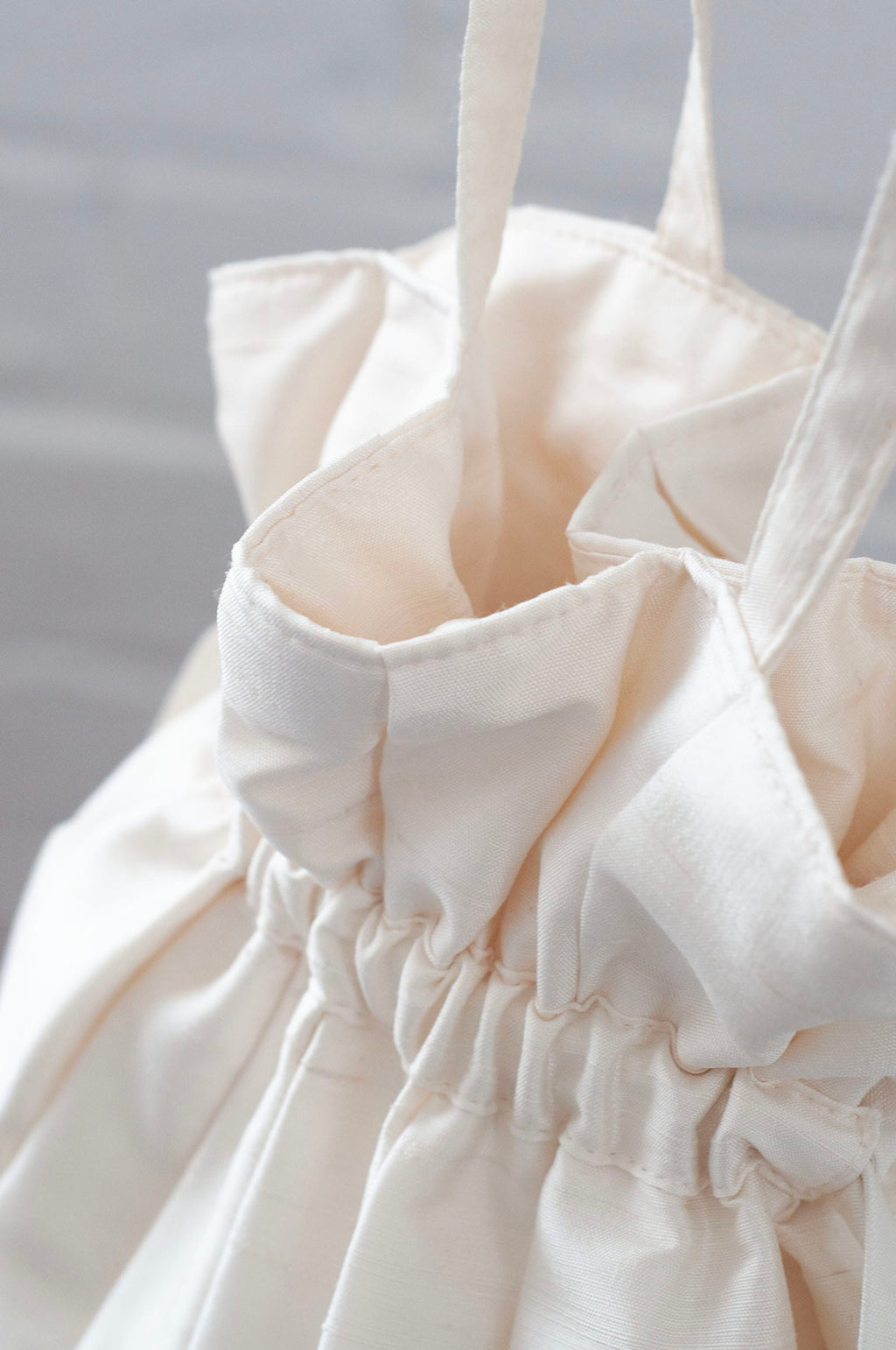 Dollis Goods Drawstring bag Occasion Bag in Ivory
