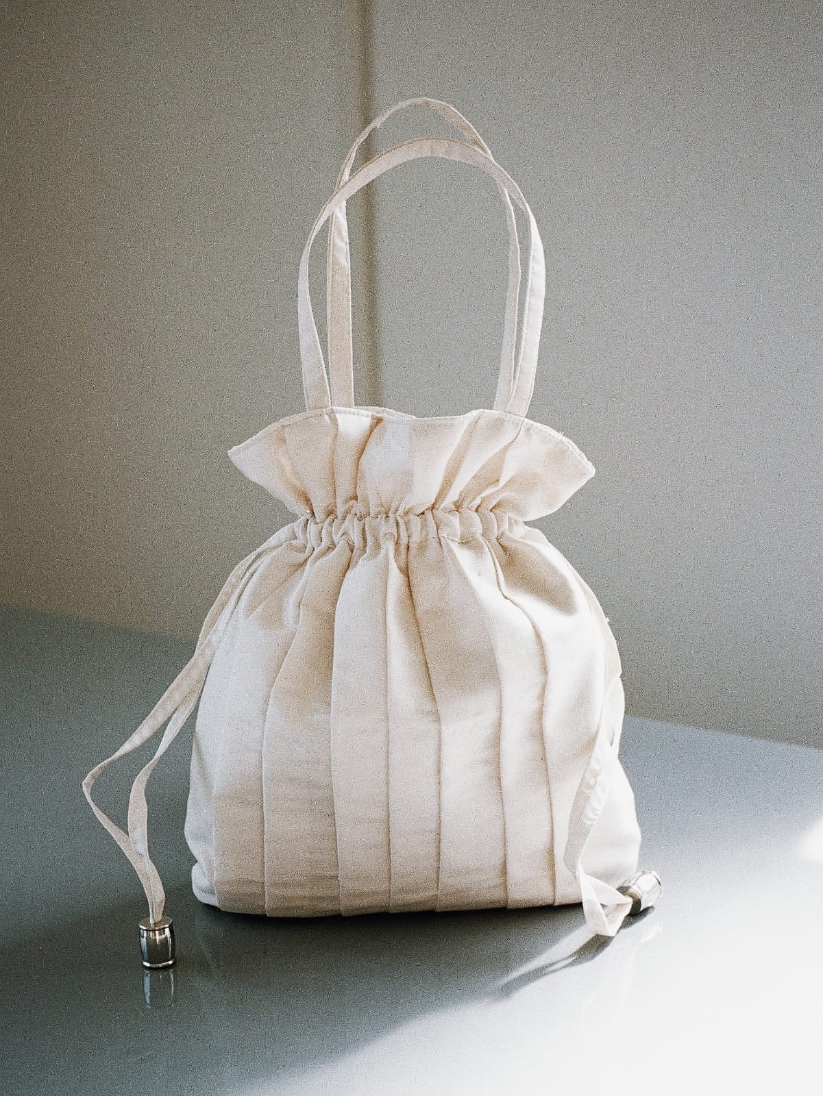 Dollis Goods Drawstring bag Occasion Bag