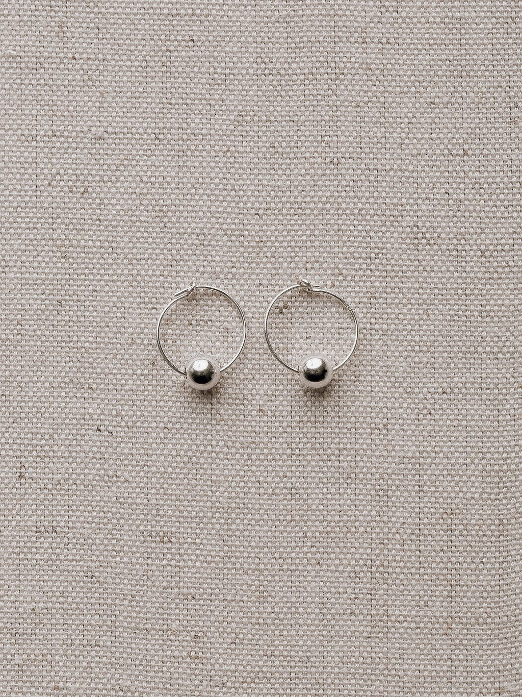 Emily Georgina Jones Jewellery Mini Bauble Hoops in Sterling Silver